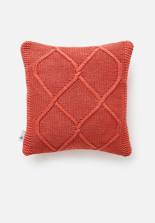 orange cushions and throws