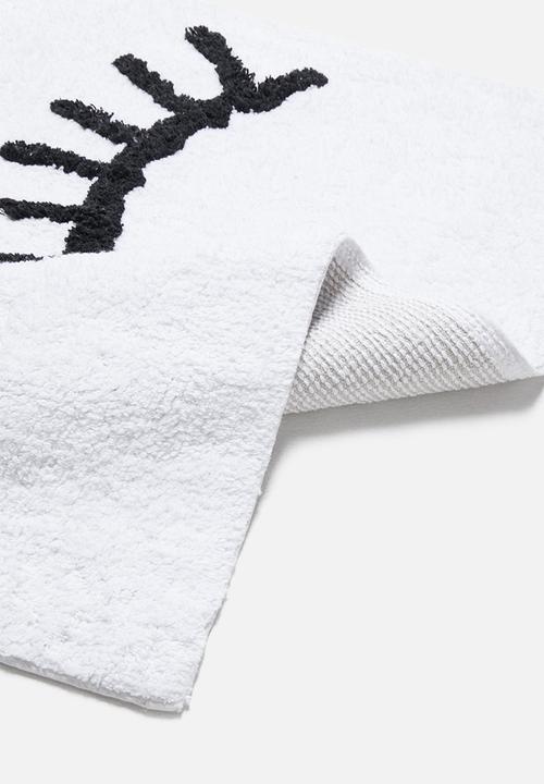 Sixth Floor - Winking tufted bath mat - white & black