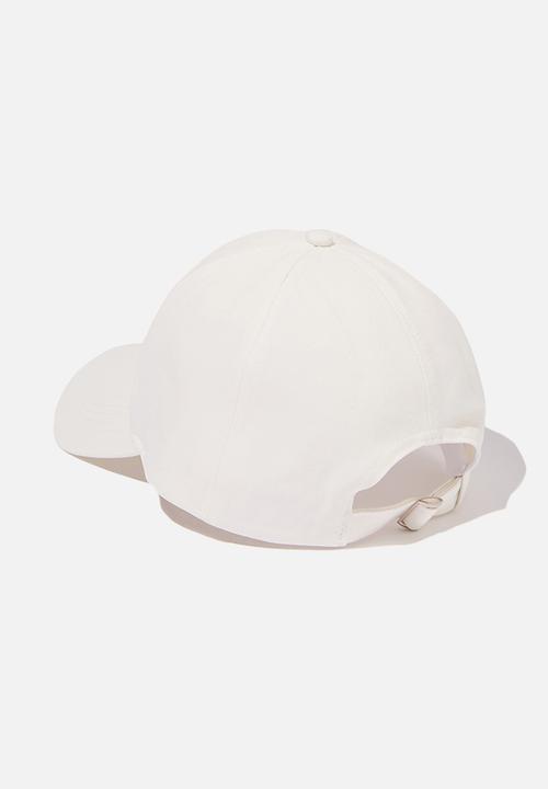 Rubi - Selina structured cap - white floral placement