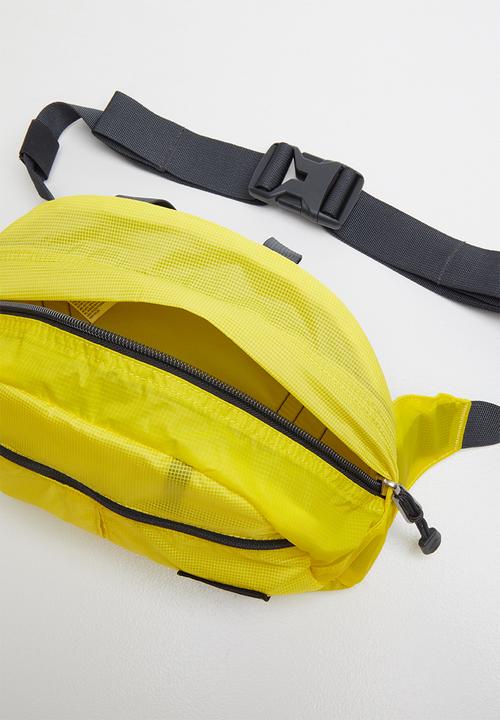 The North Face - Flyweight lumbar bag - yellow