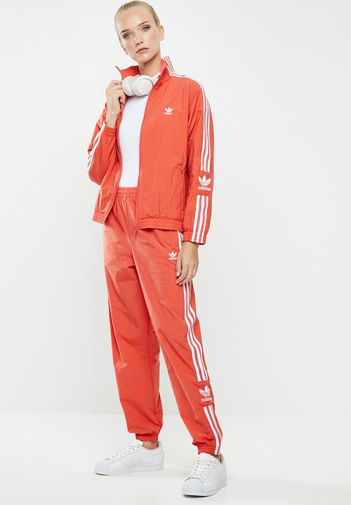 adidas Originals - Adicolour lock up track pants - orange & white