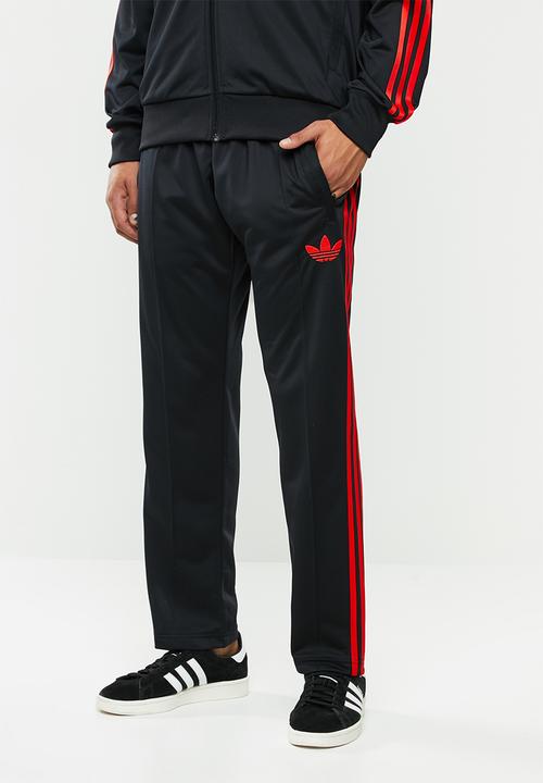 adidas red and black track pants