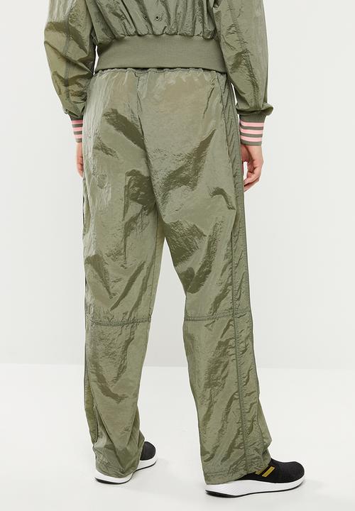 adidas Performance - Woven pants - green