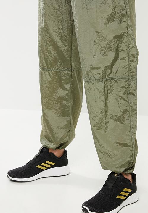 adidas Performance - Woven pants - green