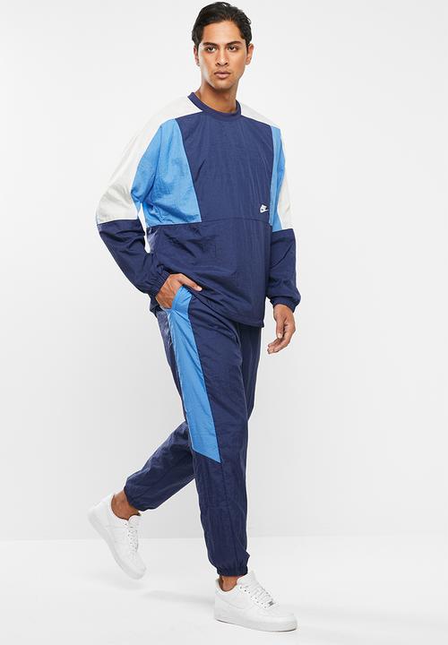 Nike - Nsw woven cf pants - midnight navy/pacific blue/white