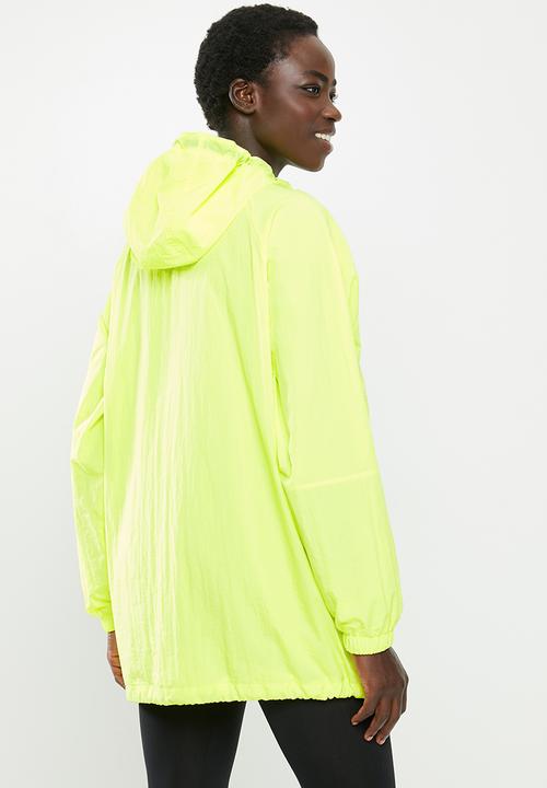 New Balance  - Optiks windbreaker - yellow