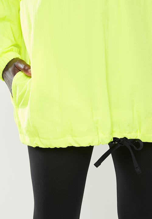 New Balance  - Optiks windbreaker - yellow
