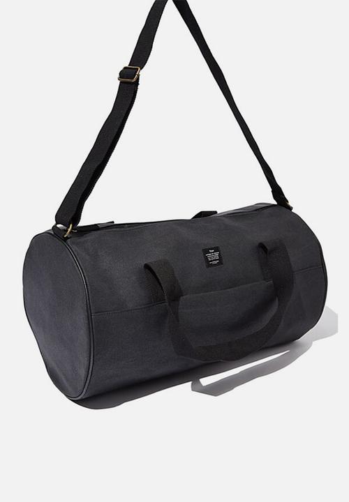 Typo - Canvas barrel bag - black