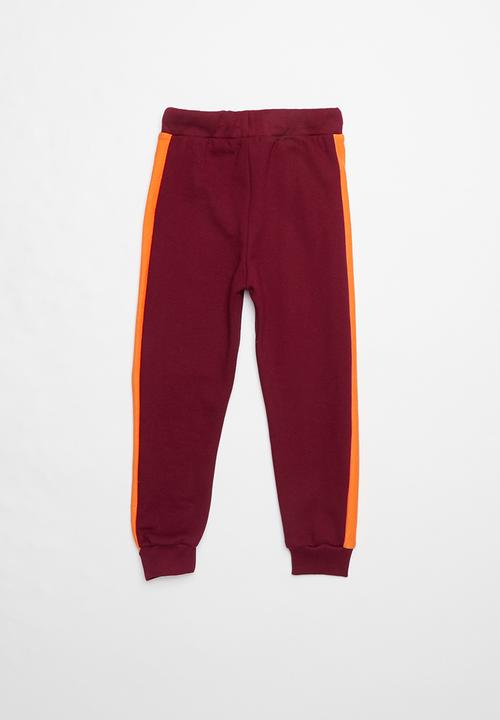 Pop Candy - Colour block trackpants- maroon & orange