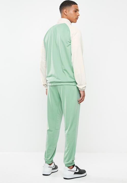 Nike - Nike sportswear ce tracksuit- light bone/silver pine/white