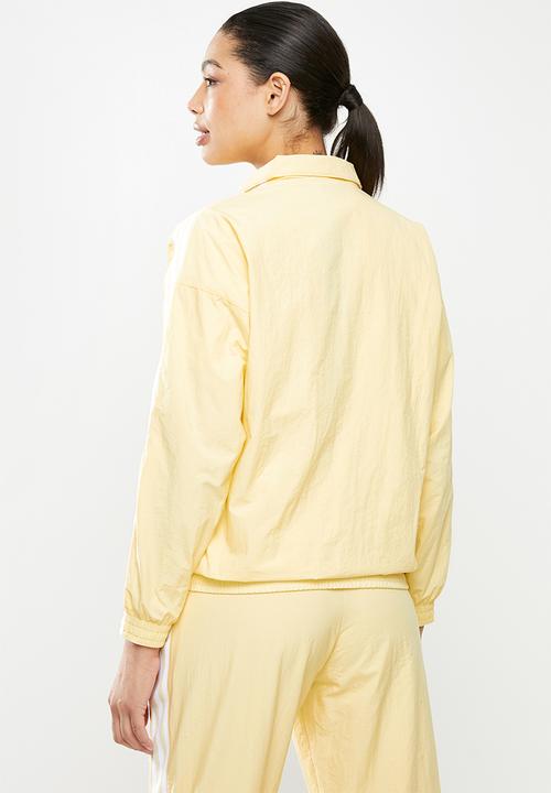 adidas Originals - Adicolour lock up track top - yellow