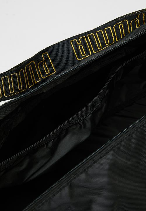PUMA - AT ESS barrel bag - puma black & metallic gold
