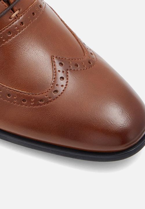 Call It Spring - Larollan - cognac