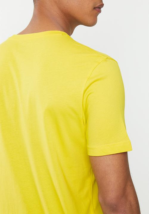 PUMA - Nu-tility graphic tee - yellow
