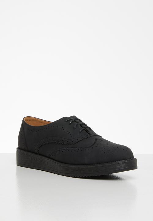 Jada - Flatform brogue - black