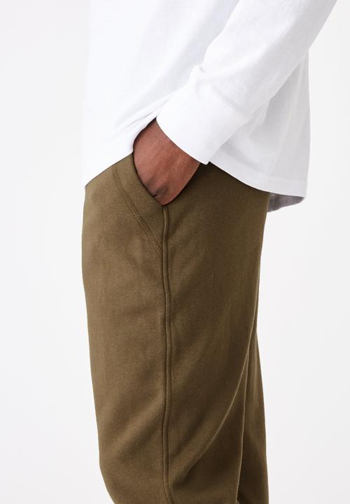 Cotton On - Trippy slim trackie - army green