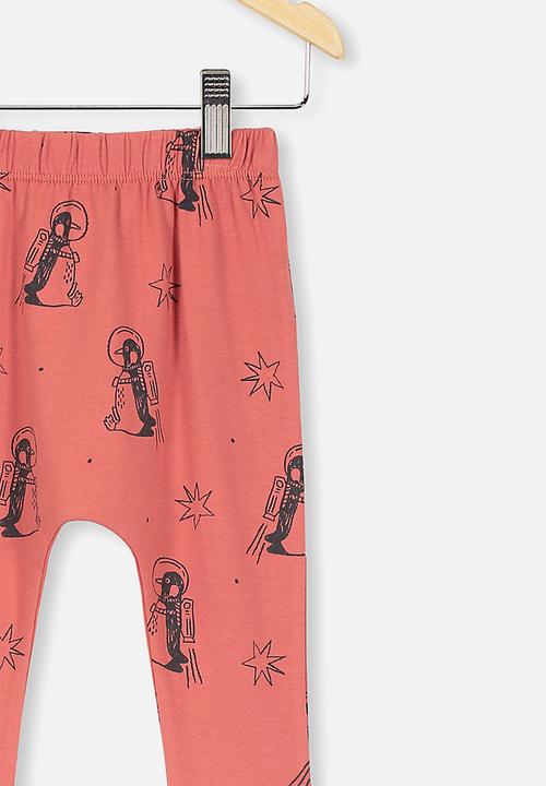 Cotton On - The legging - red brick/penguin astronaut