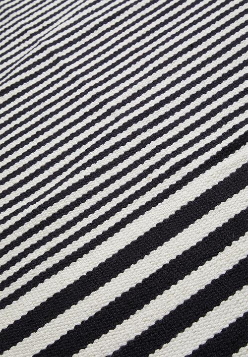 Sixth Floor - Goa woven outdoor rug - natural & black