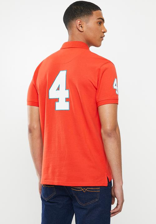 POLO - Prs logo mania golfer - orange