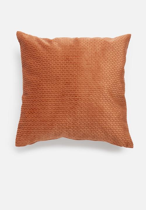 orange cushions and throws