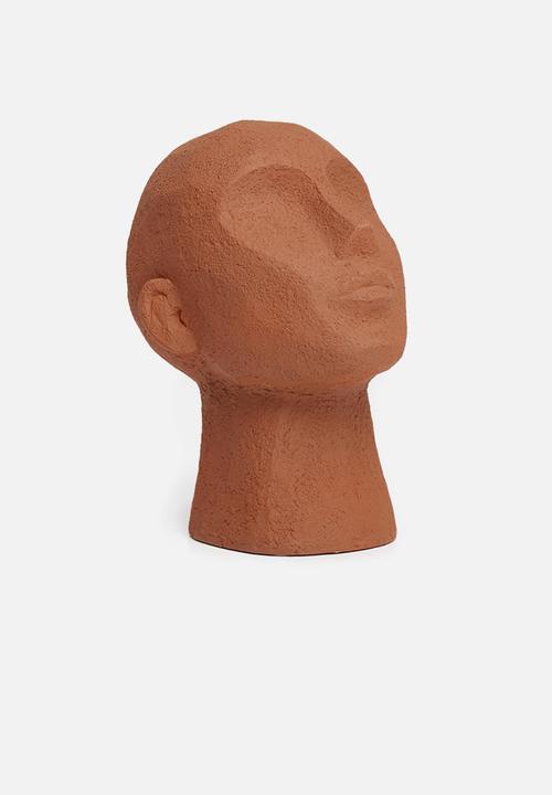 Present Time - Statue face art up - terracotta orange