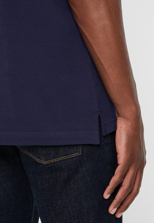 Pringle of Scotland - St augustine styled  golfer- navy