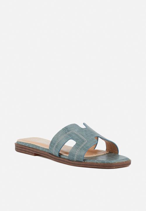 Miss Black - Discopia slide - blue
