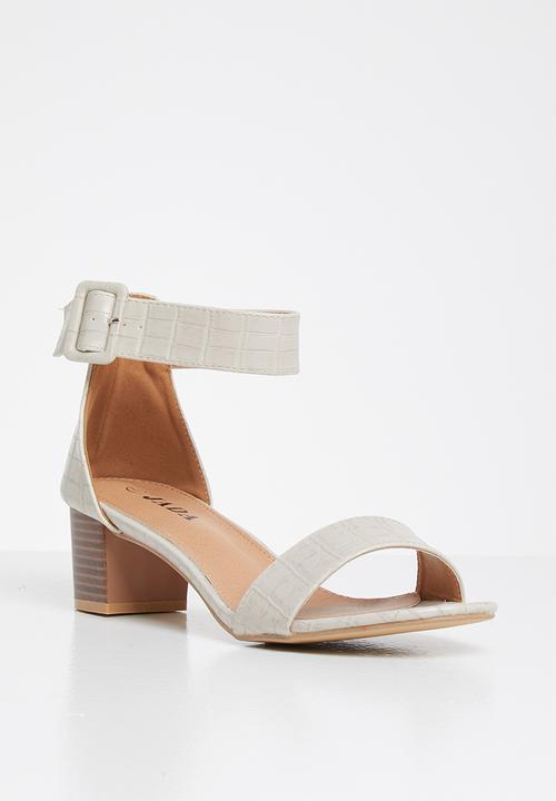 Jada - Ankle strap block heel - stone