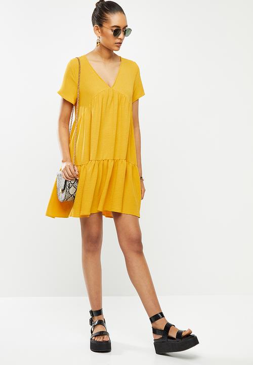 Blake - Knit tiered mini dress - ochre