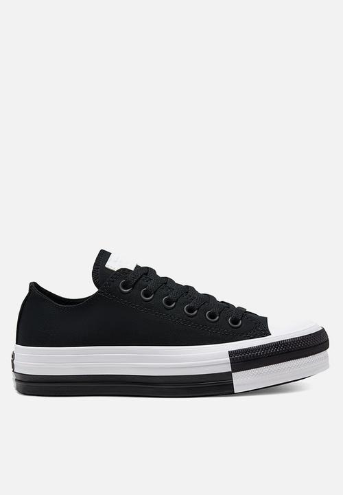 white and black converse shoes