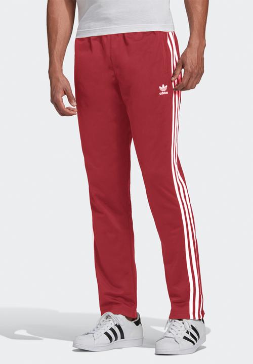 red and white adidas sweatpants