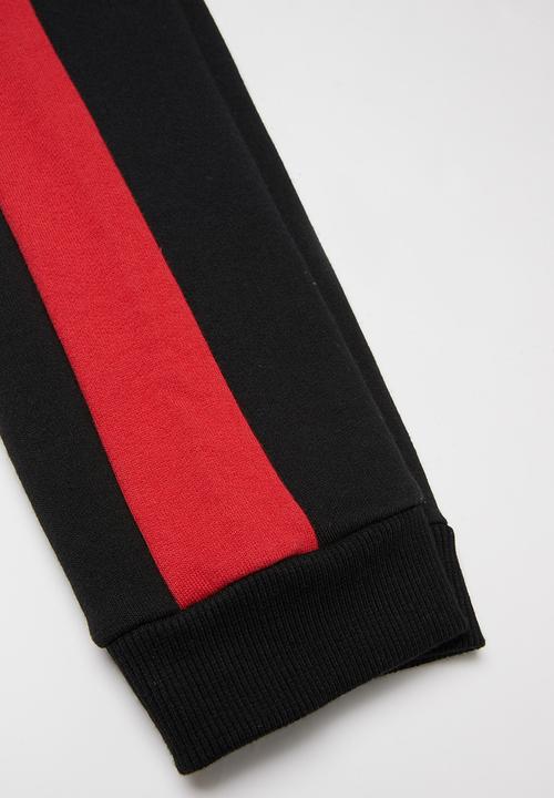GUESS - Guess fashion active pants - black & red 