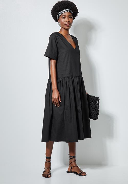 Superbalist - Dropped waist pocket detail midi - black