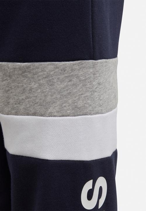 adidas Originals - Linear colourblock pants - navy & white 