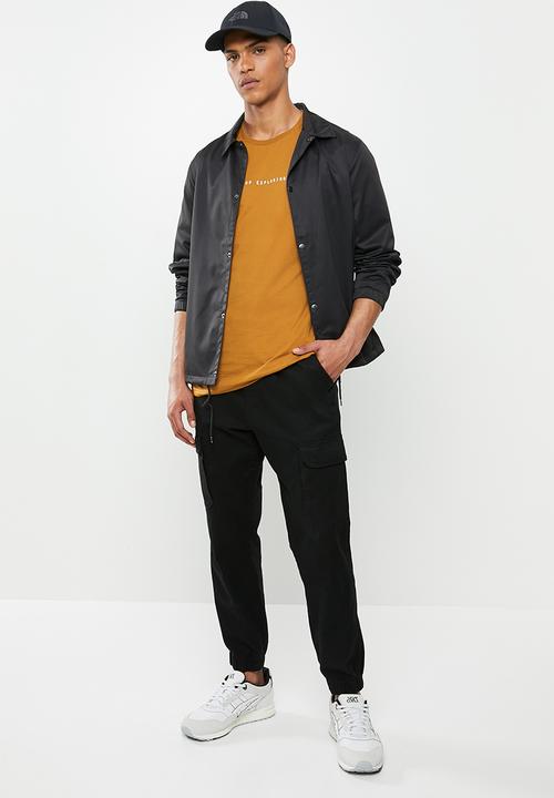 The North Face - Short sleeve nse tee - mustard