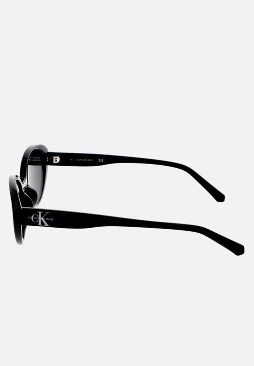 CALVIN KLEIN JEANS - DNU - Calvin klein jeans oval sunglasses - black