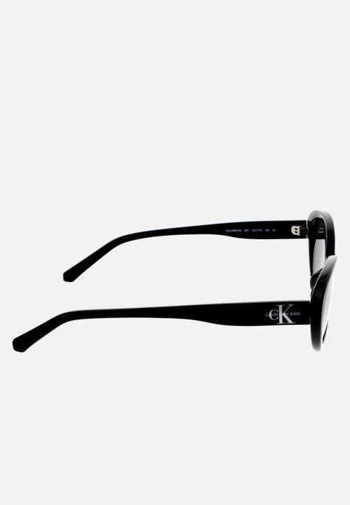 CALVIN KLEIN JEANS - DNU - Calvin klein jeans oval sunglasses - black