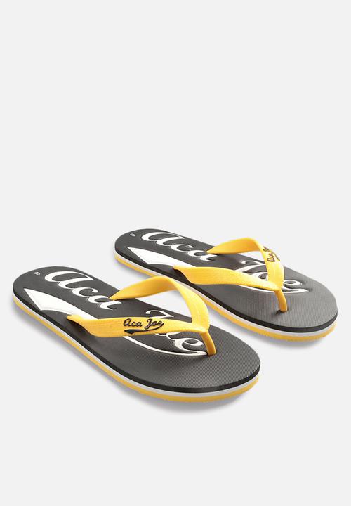 Aca Joe - Printed slip slops - black/white/yellow