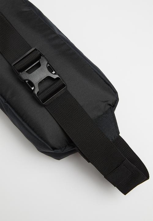 PUMA - Originals waist bag - black & gold