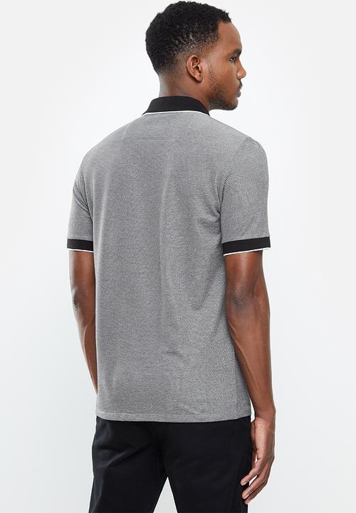 GUESS - Short sleeve Guess fashion contrast pocket/collar golfer - black 