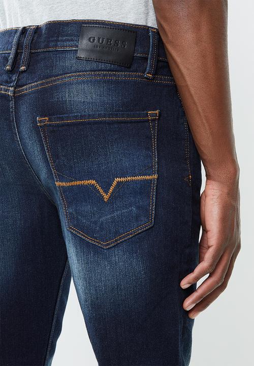 GUESS - Slim straight jeans - washed blue