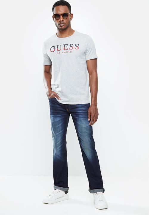 GUESS - Slim straight jeans - washed blue