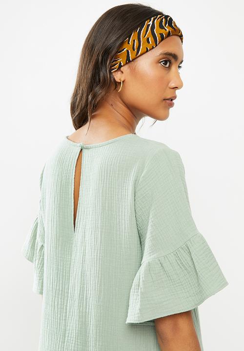 Blake - Dropped waist mini dress with ruffle sleeve - antique sage