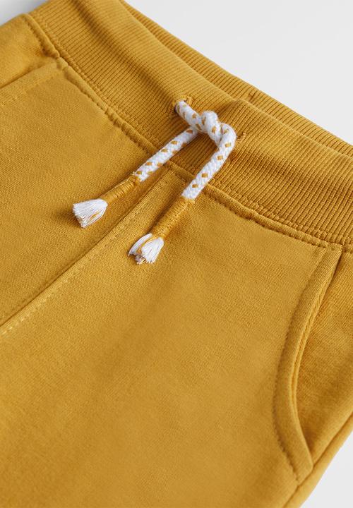 MANGO - Mateop trousers - yellow