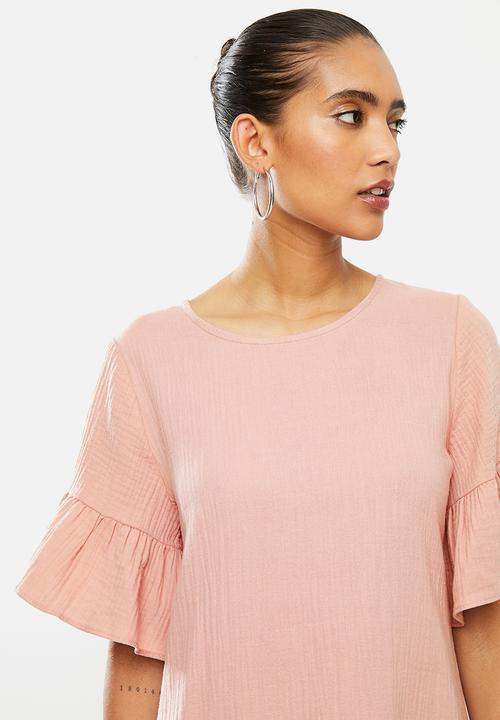 Blake - Dropped waist mini dress with ruffle sleeve - pale rose