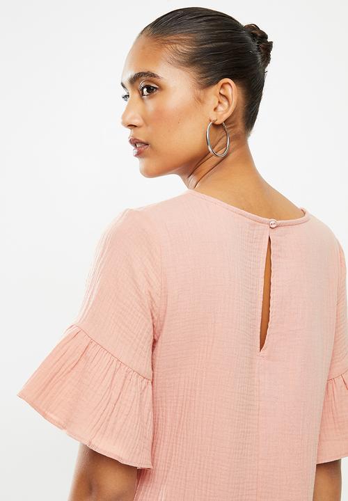 Blake - Dropped waist mini dress with ruffle sleeve - pale rose
