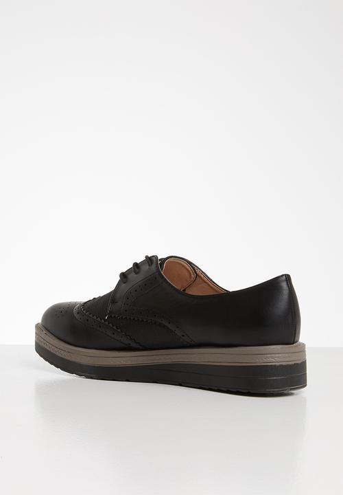 Seduction - Faux leather flatform brogue - black