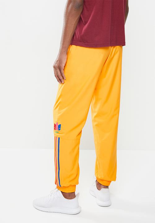 adidas Originals - 3D 3 stripe trackpants - gold