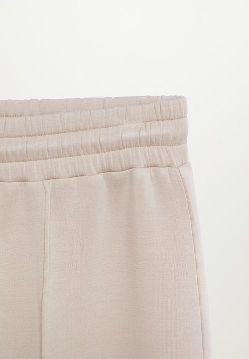 MANGO - Trousers neosoft - light/pastel brown