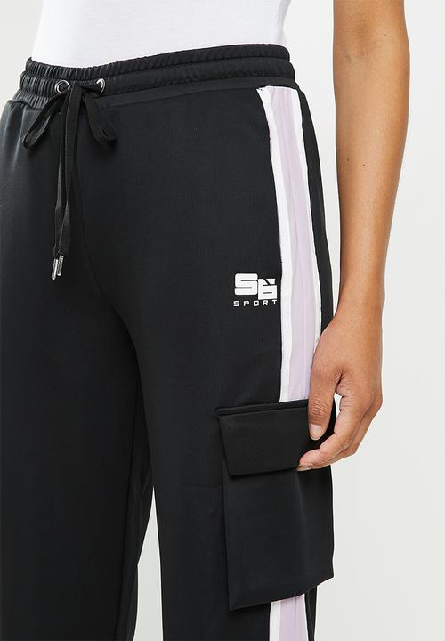 SISSY BOY - Track pants with zippable ankle areas - black & lilac
